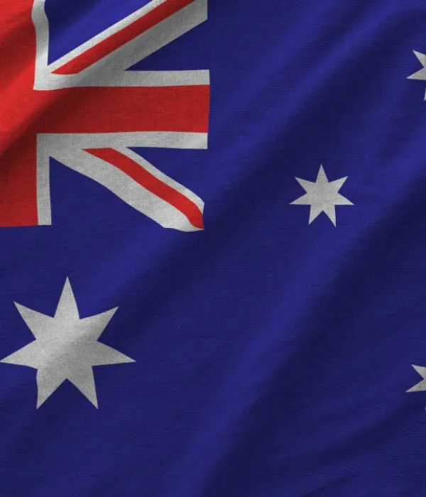 Australia flag depicted on folded wavy fabric of old cloth close up