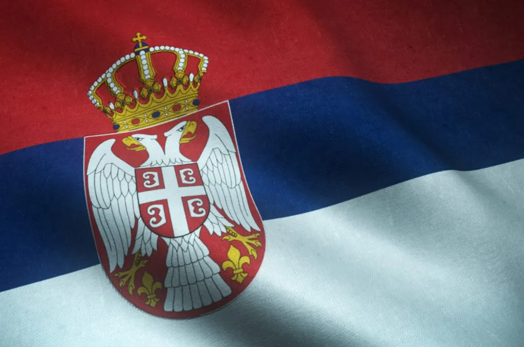 A closeup shot of the waving flag of Serbia with interesting textures